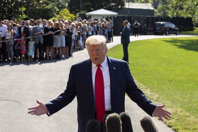 August 9, 2019 - Washington, DC, United States: United States President Donald J. Trump speaks to the media as he departs the White House en route to a fundraising event in Long Island, NY. (Stefani Reynolds / Contacto)