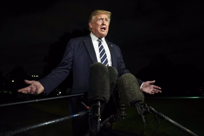 August 23, 2019 - Washington, DC, United States: United States President Donald J. Trump speaks with members of the media as he departs the White House en route to Joint Base Andrews where he will fly to Bordeaux to attend the 45th G7 summit in Biarritz