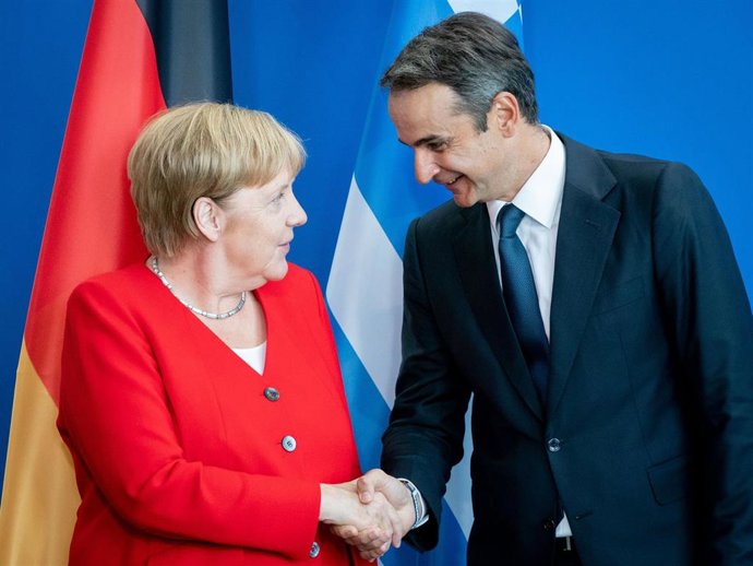 Angela Merkel y Kyriakos Mitsotakis