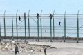 155 migrantes acceden a Ceuta en un salto en grupo de la valla y ocho encaramados son devueltos a Marruecos