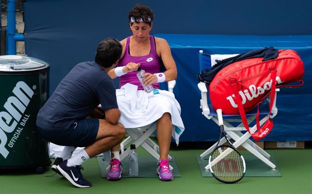 Carla Suarez Navarro of Spain in action during her first-round match at the 2019 Western & Southern Open WTA Premier Tennis 5 Tournament against Ekaterina Alexandrova of Russia