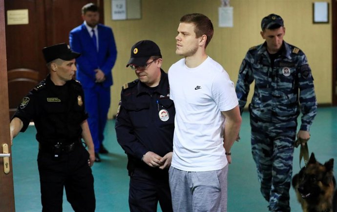 Russian soccer players Pavel Mamayev and Alexander Kokorin attend a court hearing in Moscow