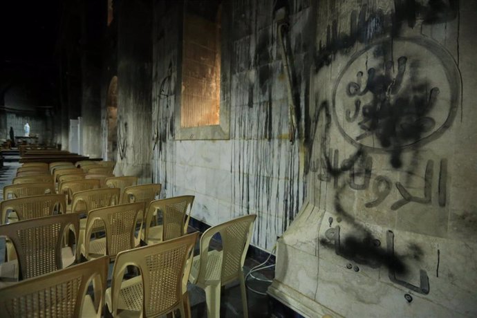 Grafiti de Estado Islámico en una iglesia en Irak