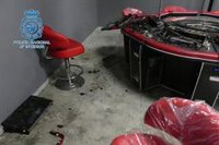 Cinco detenidos por incendiar un salón de juegos en Sevilla para "monopolizar" el negocio en la zona