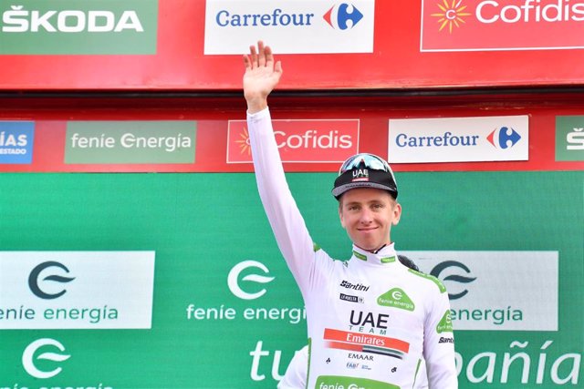 11 September 2019, Spain, Guadalajara: Slovenian cyclist Tadej Pogacar of UAE Team Emirates celebrates on the podium in the white jersey for best young rider after stage 17 of the 2019 edition of the "Vuelta a Espana" Tour of Spain cycling race, 219.6 km,