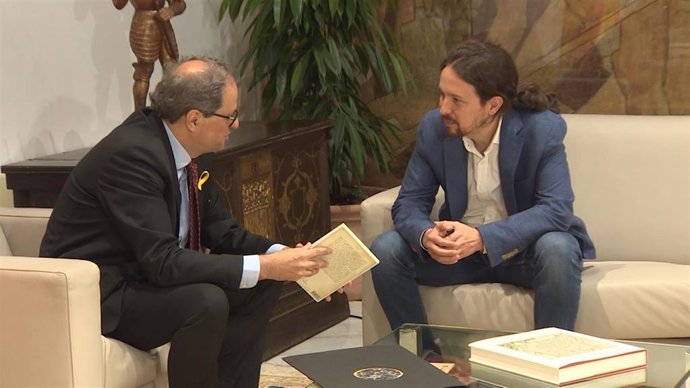 El presidente del Govern, Quim Torra, y el secretario general de Podemos, Pablo Iglesias, reunidos en Barcelona