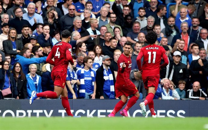 Roberto Firmino celebra un gol con el Liverpool FC.