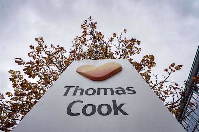 25 September 2019, Hessen, Hesse: The logo of the British travel group Thomas Cook pictured in front of the headquarters of the German Thomas Cook travel group. Four days after the bankruptcy of the British parent company, the German subsidiary filed fo