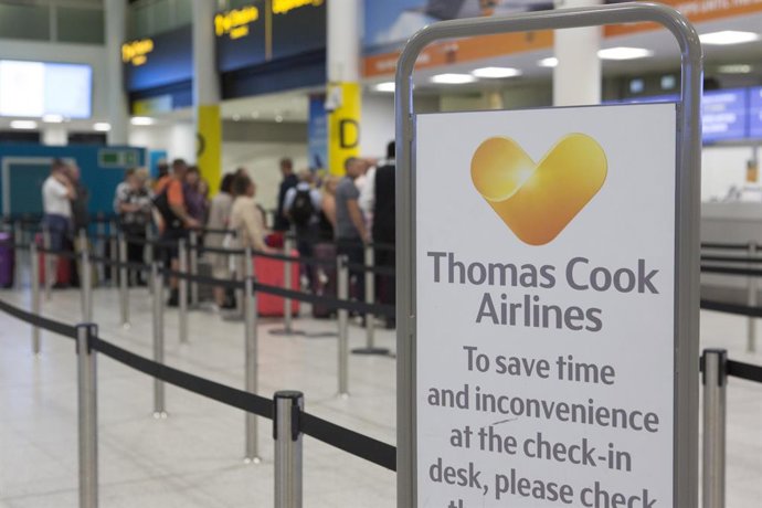 23 September 2019, England, Gatwick: A check-in counter of the British travel group Thomas Cook in the south terminal of Gatwick Airport. Thomas Cook, one of Britain's biggest travel firms, filed for liquidation early Monday, ceasing all trading with im