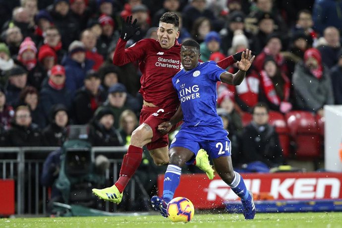 Leicester City midfielder Nampalys Mendy (24) and Liverpool forward Roberto Firmino (9) during the Premier League match between Liverpool and Leicester City at Anfield, Liverpool, England on 30 January 2019. Photo Craig Galloway / ProSportsImages / DPPI