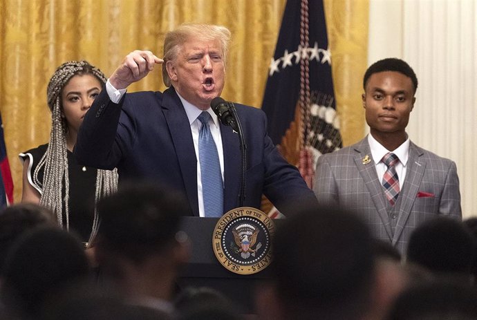 October 4, 2019 - Washington, DC, United States: United States President Donald J. Trump participates in the Young Black Leadership Summit 2019 at the White House. With Trump are Kearyn Bolin, President of Turning Point USA at Texas State University(L) 
