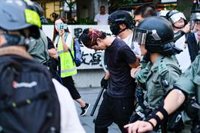 Un tribunal mantiene la prohibición contra las máscaras antes de una nueva protesta multitudinaria en Hong Kong