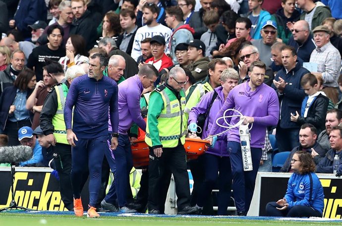 05 October 2019, England, Brighton: Tottenham Hotspur goalkeeper Hugo Lloris is stretchered off the pitch after sustaining an injury during the English Premier League soccer match between Tottenham Hotspur and Brighton and Hove Albion at the AMEX Stadiu