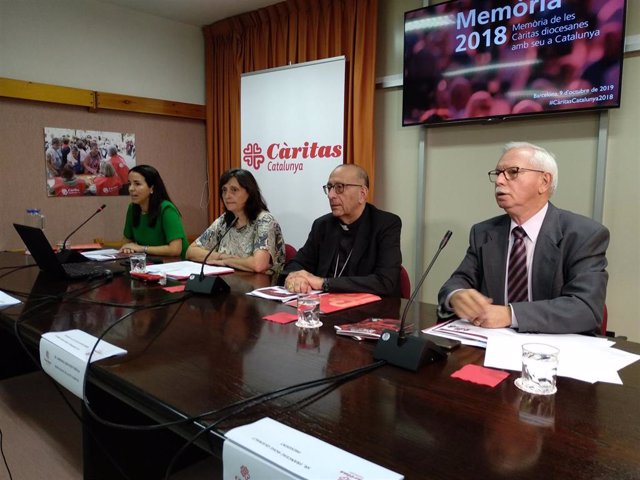 Anna Roig, Conxa Marqués, Joan Josep Omella y Francesc Roig en la rueda de prensa de Càritas de Catalunya sobre datos de 2018