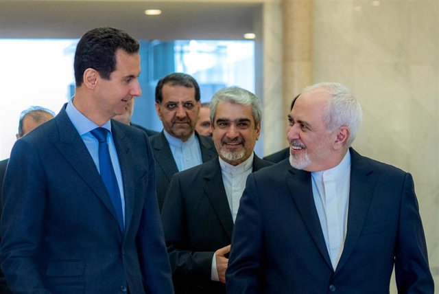 Bashar al Assad y Mohamed Javad Zarif