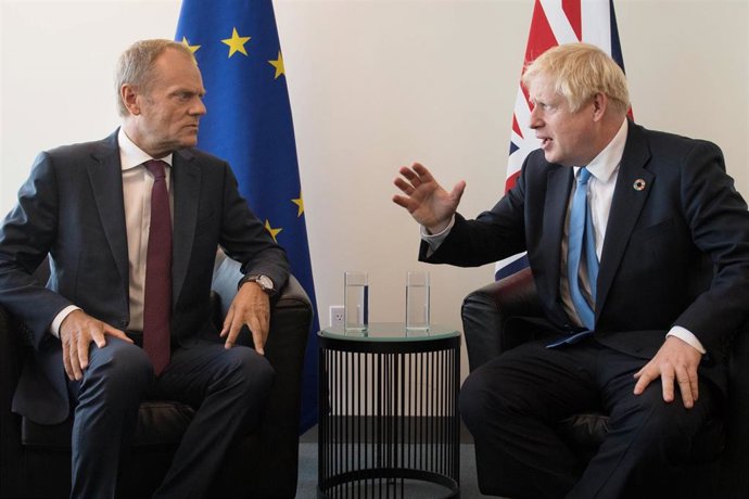 Donald Tusk y Boris Johnson