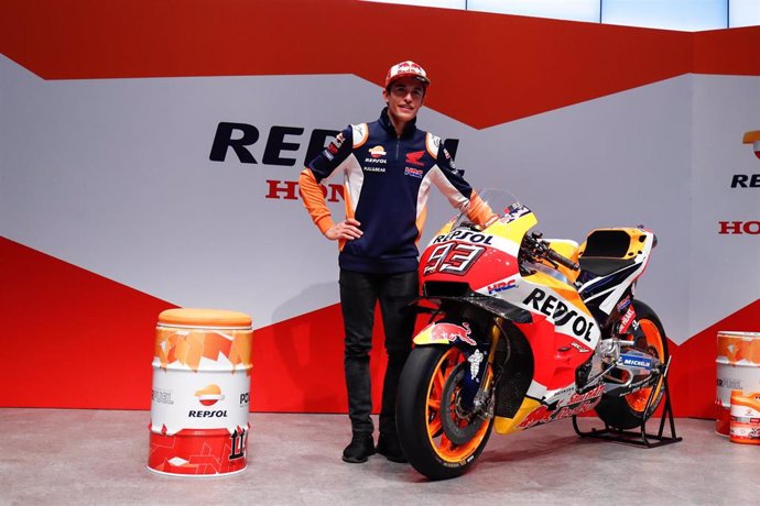 Marc Marquez of Spain and Repsol Honda Team poses with his MotoGP Honda bike during the press conference after winning the MotoGP World Champion title at Repsol Campus in Madrid, Spain, on October 08, 2019.