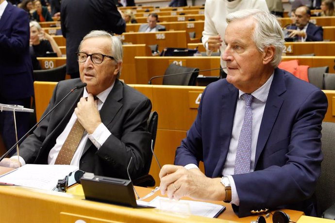 Michel Barnier y Jean-Claude Juncker