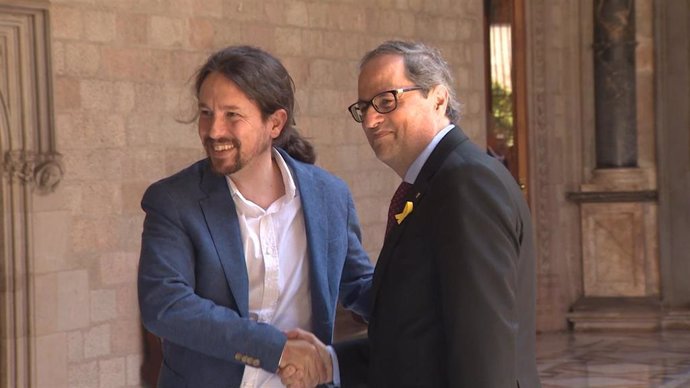 El presidente del Govern, Quim Torra, y el secretario general de Podemos, Pablo Iglesias, reunidos en Barcelona