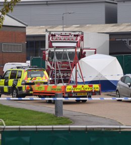 23 October 2019, England, Grays: A lorry container is seen at the Waterglade Industrial Park after 39 bodies were found inside a lorry container. Police said the truck driver was arrested. Photo: Stefan Rousseau/PA Wire/dpa