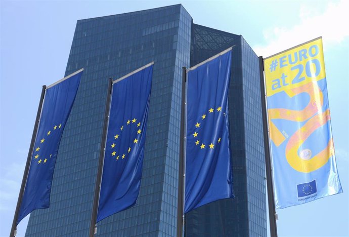 FILED - 25 July 2019, Frankfurt_Main: EU flags fly in front of the headquarters of the European Central Bank (ECB). Photo: Arne Dedert/dpa