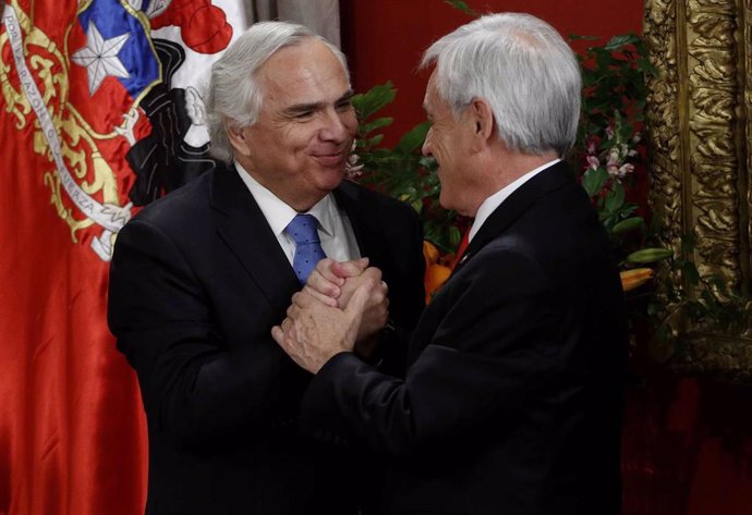 El ex ministro de Interior Andrés Chadwick con el presidente chileno, Sebastián Piñera
