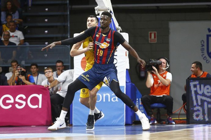 Fall (Baskonia) y Shermadini (Tenerife)