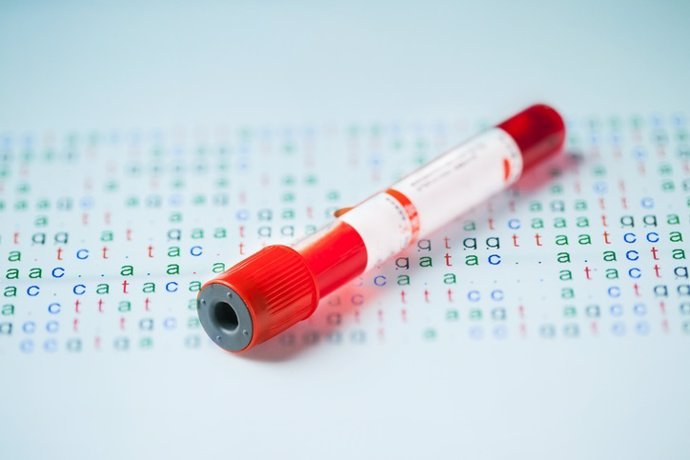 Blood sample in test tube with DNA code
