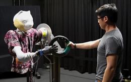 Imagen de un robot de Disney Research agarrando un objeto.