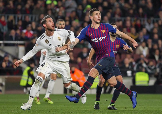Sergio Ramos of Real Madrid and Lenglet of Barcelona in action during Spanish King championship, football match between Barcelona and Real Madrid, February 06th, in Camp Nou Stadium in Barcelona, Spain.