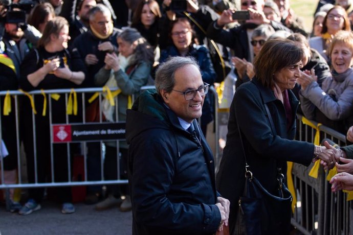 El president de la Generalitat, Quim Torra, junto a su mujer Carola Muró, a su salida del Tribunal Superior de Justicia de Cataluña. Catalunya (España), a 18 de noviembre de 2019.