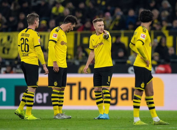 Fútbol/Champions.- El Borussia Dortmund levanta un 0-3 y salva un punto con el c