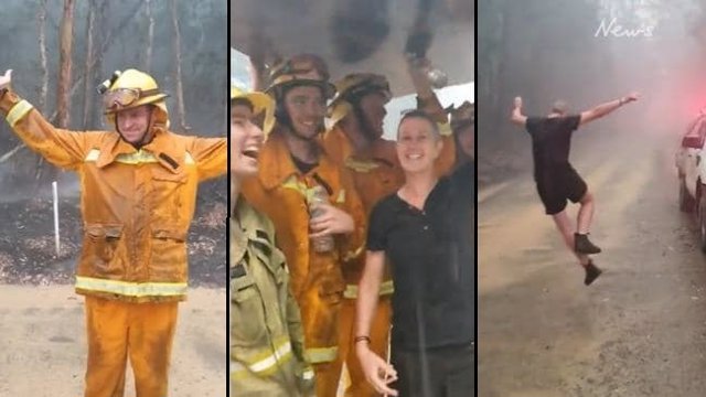 La felicidad de los bomberos australianos al caer la lluvia en una zona boscosa azotada por los incendios