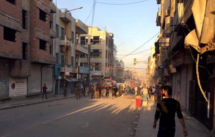 Personas tras una explosión en Qamishli, Syria, el pasado 11 de noviembre