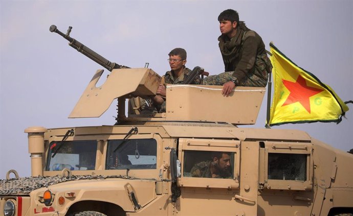 Miembros de las Fuerzas Democráticas Sirias (FDS) en Baghuz, último reducto del Estado Islámico.