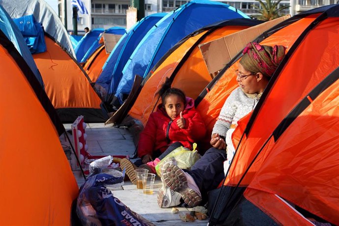 Refugiados en un campamento frente al parlamento griego en Atenas.