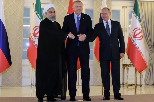 Russia, Turkey and Iran, worried about the presence of terrorist groups in the Syrian province of Idlib Hasán Rohani, Recep Tayyip Erdogan y Vladimir Putin