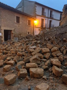 Efectos del derrumbe de un muro de contención en el barrio rural de Malpica de Arba, en Biota (Zaragoza).