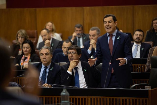 El presidente de la Junta de Andalucía, Juanma Moreno, durante su intervención. En Sevilla, a 19 diciembre de 2019.