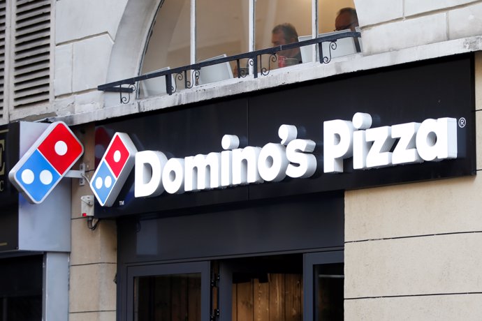 The sign of a Domino's Pizza restaurant is seen in Paris