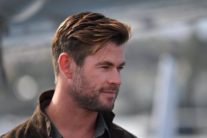 26 June 2019, Australia, Sydney: Australian actor Chris Hemsworth poses for a photograph during the Tag Heuer Autavia Collection launch at the Sydney Seaplanes Terminal. Photo: Steven Saphore/AAP/dpa