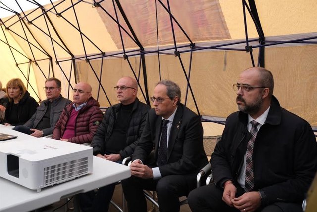 El presidente de la Generalitat, Quim Torra y el conseller de Interior, Miquel Buch en el Centro de Mando Avanzado
