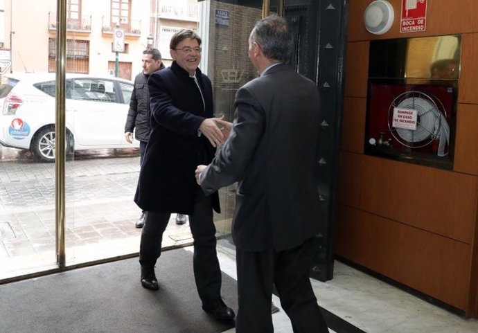 Puig y Navarro se saludan antes de un almuerzo en la sede de la CEV