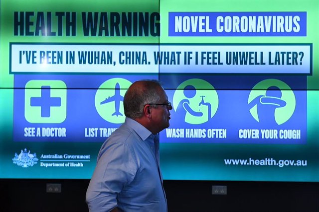Prime Minister Scott Morrison is updated on the steps being taken to control the coronavirus at the National Incident Room of the Department of Health in Canberra, Wednesday, January 22, 2020. 