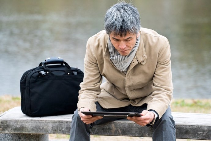 Businessman holding a tablet device