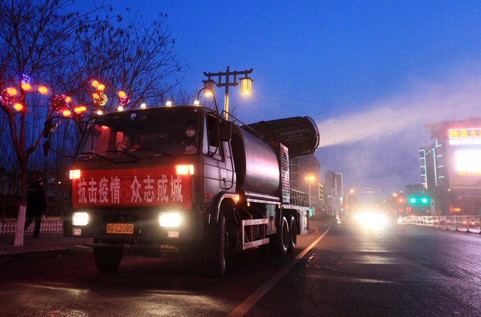 05 February 2020, China, Zhangjiakou: A fog gun truck sprays disinfectant at Xuanhua district streets to fight the new coronavirus. Photo: -/TPG via ZUMA Press/dpa