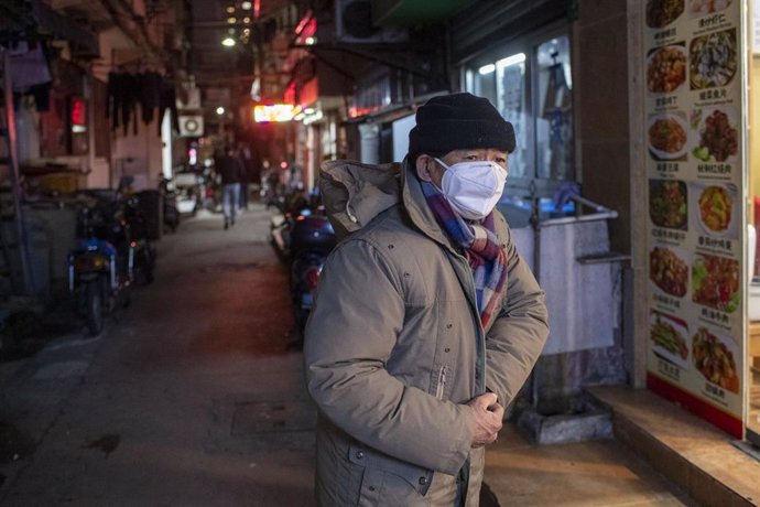 February 3, 2020 - Shanghai, China: An elderly man stands near the entrance to a restaurant Wufu Alley in Huangpu District. So far 361 people have died in China as a result of coronavirus infection, many of them elderly. (Dave Tacon/Contacto)