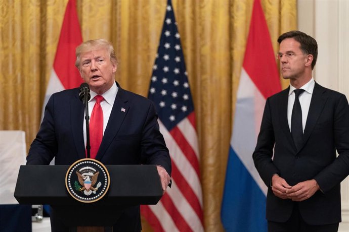 July 18, 2019 - Washington, DC, United States: US President Donald J. Trump, joined by the Prime Minister of the Netherlands Mark Rutte, participates in the presentation of a World War II flag flown aboard a landing craft during the D-Day invasion at No