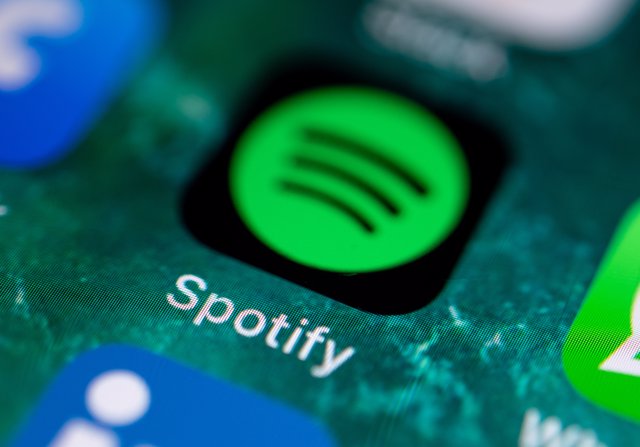 FILED - 21 June 2019, Stuttgart: The app icon of the music service Spotify can be seen on the display of an iPhone.Photo: Fabian Sommer/dpa