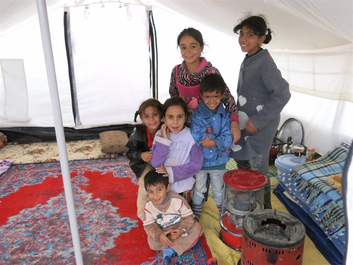 Grupo de niños refugiados que estaban viviendo en un colegio de Kirkuk.
